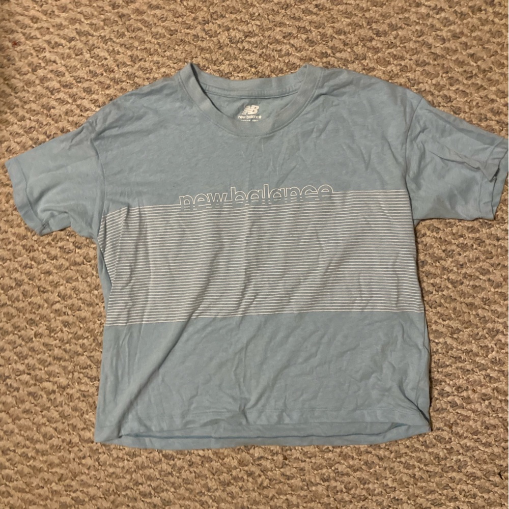 Blue New Balance workout shirt. Never worn!